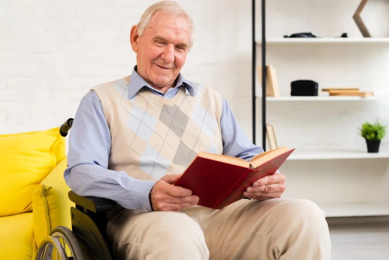 An elderly man in wheelchair